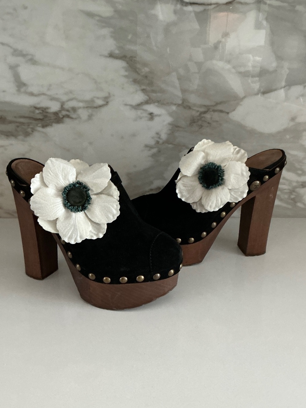 CHANEL Black Suede Platform Mules with White Flower Accent
